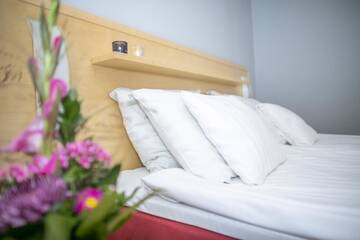 Фото номера Стандартный двухместный номер с 2 отдельными кроватями Отель Hotel Uusikuu г. Миккели 11