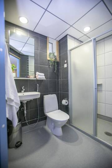 Фото номера Стандартный двухместный номер с 2 отдельными кроватями Отель Hotel Uusikuu г. Миккели 12