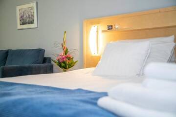 Фото номера Стандартный двухместный номер с 2 отдельными кроватями Отель Hotel Uusikuu г. Миккели 30