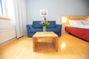 Фото номера Стандартный двухместный номер с 2 отдельными кроватями Отель Hotel Uusikuu г. Миккели 28