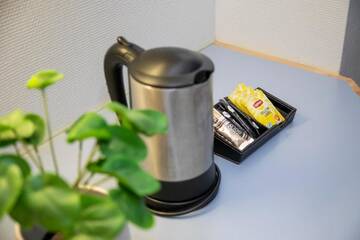 Фото номера Стандартный двухместный номер с 2 отдельными кроватями Отель Hotel Uusikuu г. Миккели 26