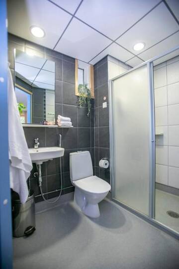 Фото номера Стандартный двухместный номер с 2 отдельными кроватями Отель Hotel Uusikuu г. Миккели 32