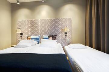 Фото номера Двухместный номер с 2 отдельными кроватями Отель Original Sokos Hotel Vaakuna Mikkeli г. Миккели 13