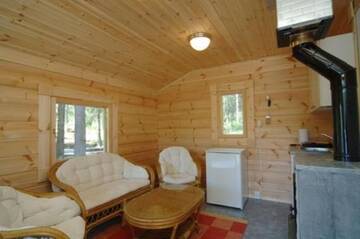 Фото номера Вилла с 3 спальнями и сауной (10 взрослых) Дома для отпуска Härkäniemi Cottages г. Миккели 26
