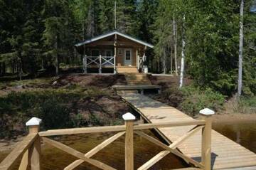 Фото номера Вилла с 3 спальнями и сауной (10 взрослых) Дома для отпуска Härkäniemi Cottages г. Миккели 10